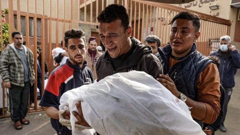 Palestinian-mourns-body-killed-Israeli-strike-Khan-Younis-Gaza-Strip-December-28-2023 2.jpg